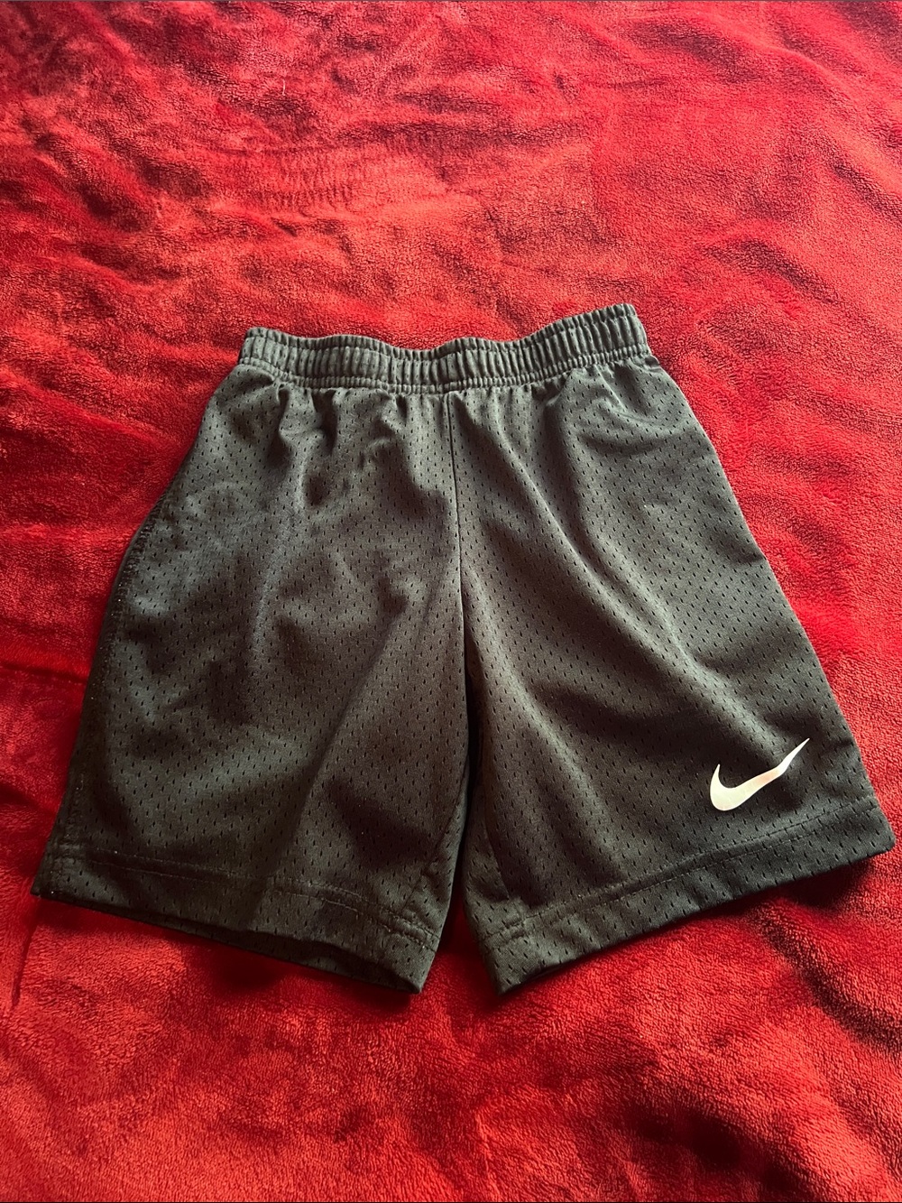 Nike Black Mesh Athletic Shorts with White Swoosh